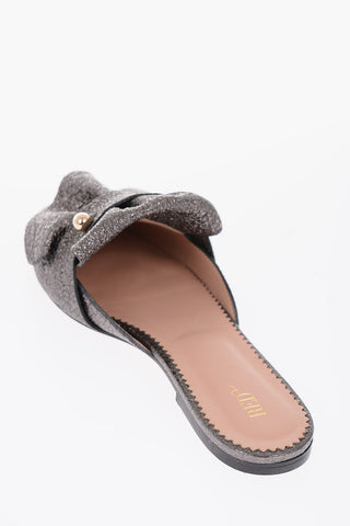 mules in pelle con dettaglio argentato