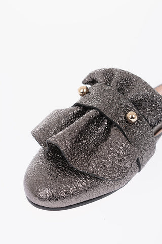 mules in pelle con dettaglio argentato