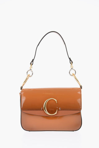 borsa in pelle lucida con tracolla removibile