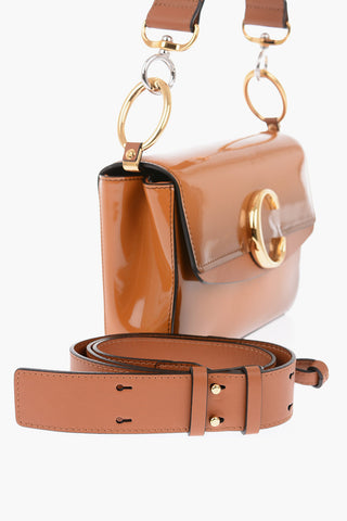 borsa in pelle lucida con tracolla removibile