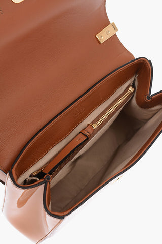 borsa in pelle lucida con tracolla removibile