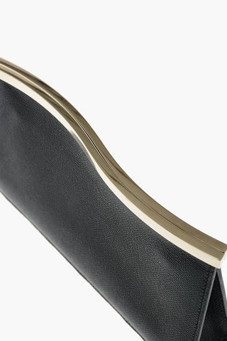 Magnetic Closure WAVY Textured Leather Clutch