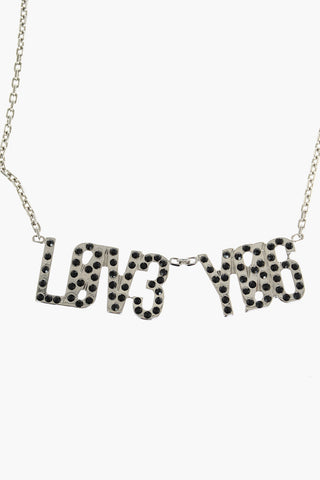 collana in metallo con pendente