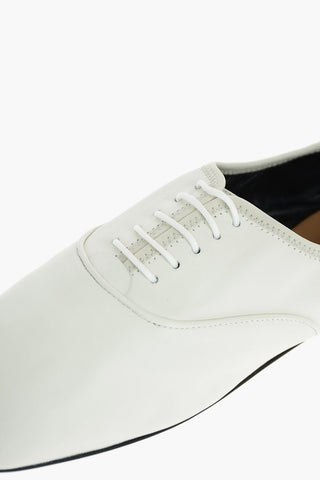 Ballerine Stringate in Pelle con Suola in Cuoio