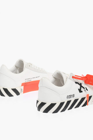canvas VULCANISED STRIPED low-top sneakers with suede details