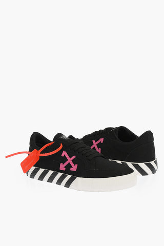 solid color LOW VULCANIZED sneakers with contrasting details