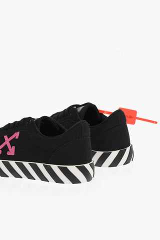 solid color LOW VULCANIZED sneakers with contrasting details