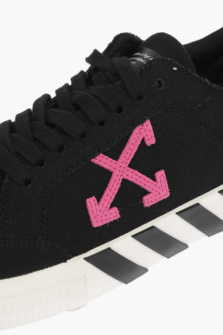solid color LOW VULCANIZED sneakers with contrasting details
