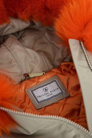 puffer jacket with rhinestone skull and fur detail