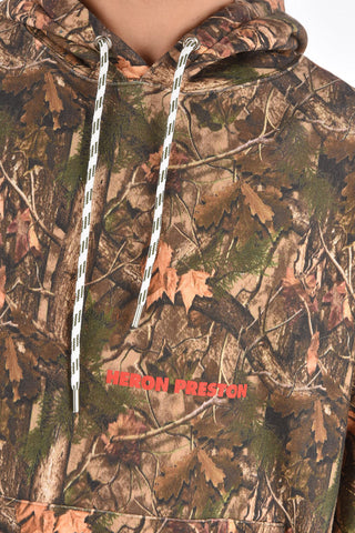 all over leaves printed hoodie with maxi patch pocket