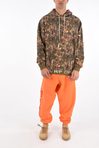 all over leaves printed hoodie with maxi patch pocket