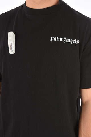 solid color crew-neck t-shirt with brooch 