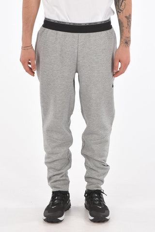 Joggers Therma Fit con Zip alla Caviglia
