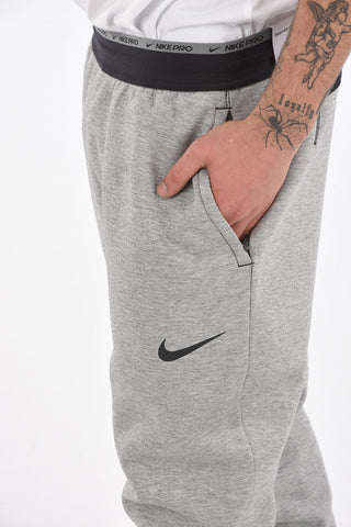 Joggers Therma Fit con Zip alla Caviglia