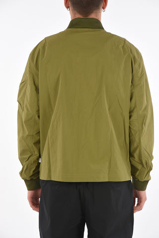 solid color Nylon Bomber with contrasting closure