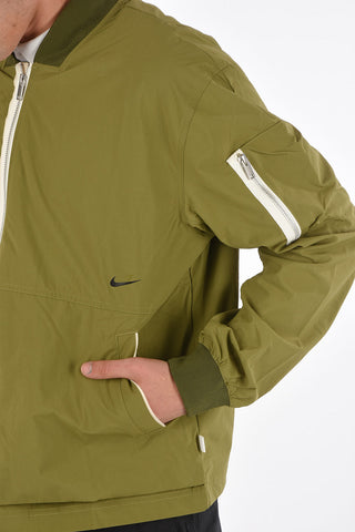 solid color Nylon Bomber with contrasting closure