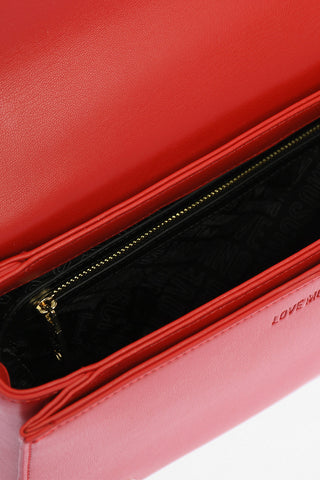 LOVE flap bag trapuntata in ecopelle con manico a catena