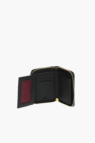 LOVE perforated faux leather wallet with golden zip closure