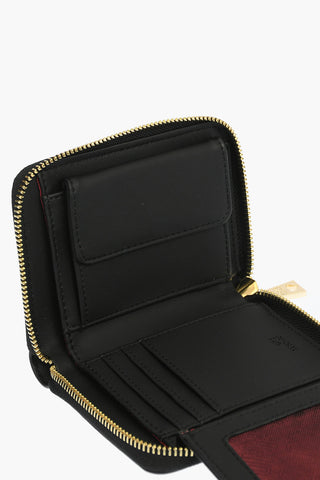 LOVE perforated faux leather wallet with golden zip closure