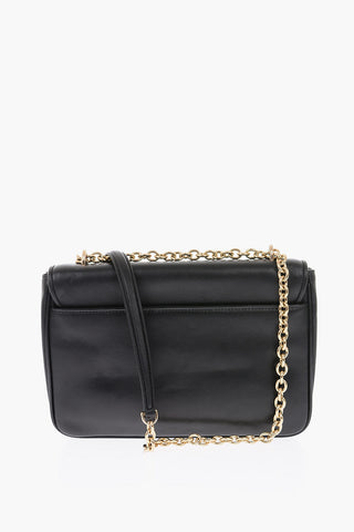 solid color leather Crossbody bag with golden details