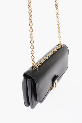 solid color leather Crossbody bag with golden details