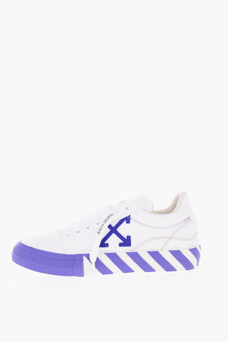 Two-tone canvas and leather VULCANIZED low top sneakers with lettering details