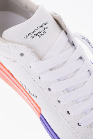 Two-tone canvas and leather VULCANIZED low top sneakers with lettering details
