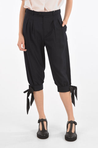 MM0 double-pleat cropped pants with bow hem