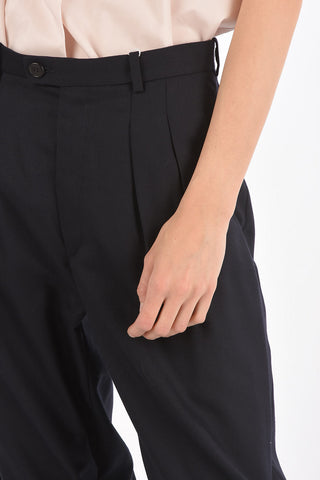 MM0 double-pleat cropped pants with bow hem