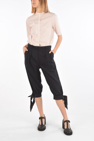 MM0 double-pleat cropped pants with bow hem