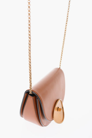 golden detail leather saddle bag