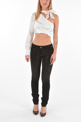 jeans Slim Fit con cristalli all over
