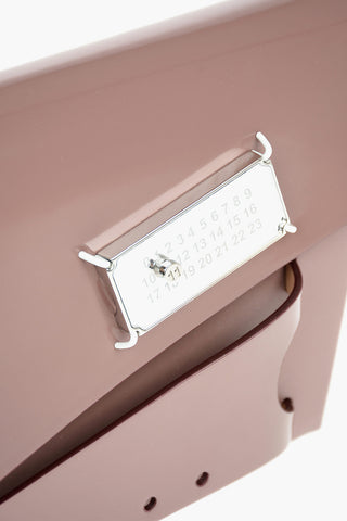 MM11 leather SNATCHED clutch with removable shoulder strap