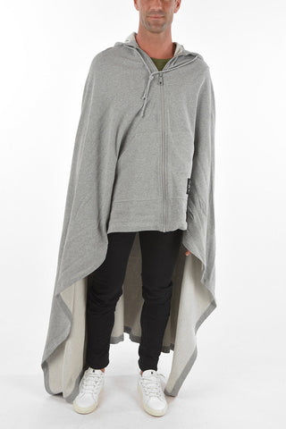 asymmetrical cape with hood and zip closure