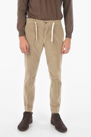 pantaloni MITTE a una pince in velluto a coste