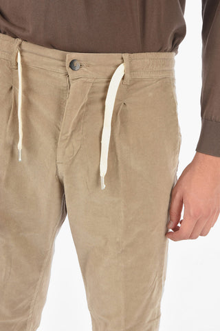 pantaloni MITTE a una pince in velluto a coste