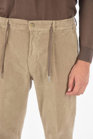 pantaloni MITTE a una pince in velluto a coste