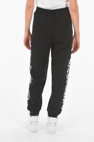 joggers a tinta unita con stampa laterale