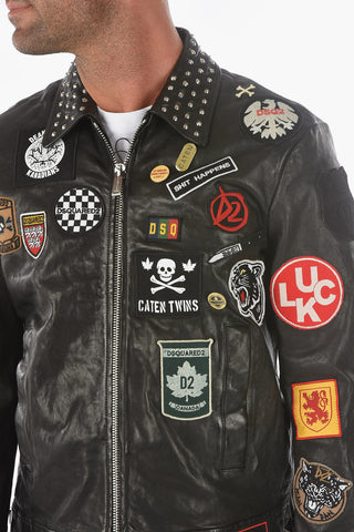 leather jacket with patches and studs on the collar