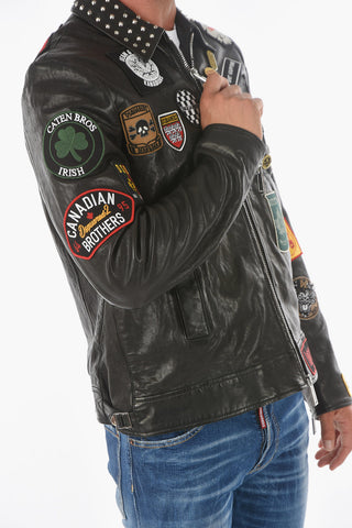 leather jacket with patches and studs on the collar