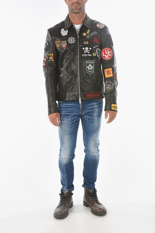 leather jacket with patches and studs on the collar