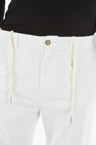 Pantaloni MITTE a una pince con elastico in vita
