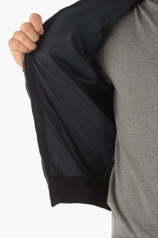 ID Piumino a 2 tasche con chiusura zip