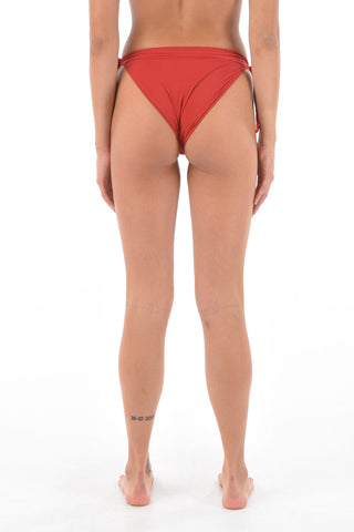 slip bikini a tinta unita con laccetti laterali