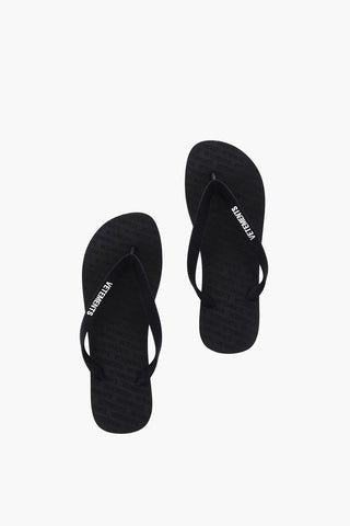 logo embossed solid color flip-flops
