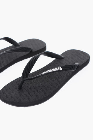 logo embossed solid color flip-flops