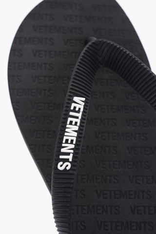 logo embossed solid color flip-flops