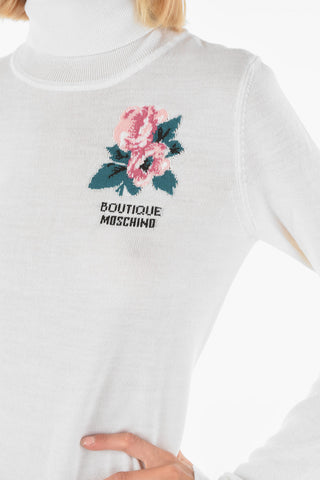 BOUTIQUE front embroidered virgin wool turtle-neck sweater