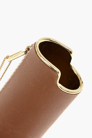 collana in pelle e ottone con frange e pendente porta accendino