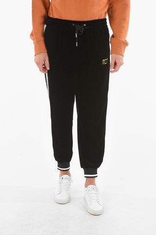 Joggers in velour con banda laterale a contrasto